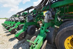 close-up-seeder-attached-tractor-field